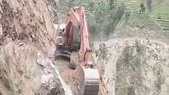 Dangerous work of hitachi excavators on cliffs