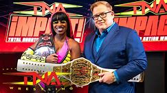 TNA Wrestling - Scott D'Amore presents Trinity with the...