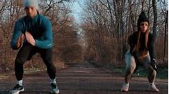 Two Athletes Doing Squats And Exercising Outdoors - 4K stock video