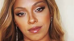 Is this Beyoncé or her twin? This woman looks EXACTLY like the popstar!