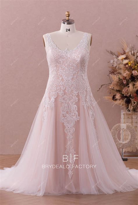Pink fit and flare wedding dress | Honestweddingadvice.com