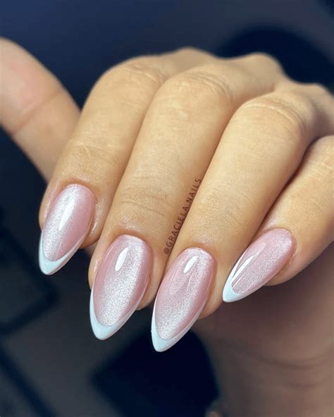 Cat-Eye Nails Are Trending Just In Time For Spooky Season | Allure