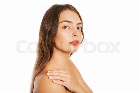 Close up portrait of beautiful young woman with perfect clean skin, with perfect nude makeup ...