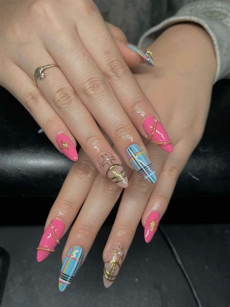 Vivienne Westwood Nails | Heart nails, Work nails, Unique acrylic nails