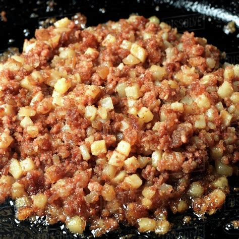 Canned Corned Beef Hash Frying in a Skillet - Royalty-free Stock Photo ...