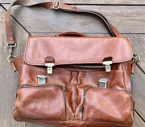 I bought this leather messenger bag/satchel from an Italian Etsy post. Cheap tanning I guess as ...