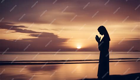 Silhouettes of a women praying during sunset | Premium AI-generated image - silhouette of a woman