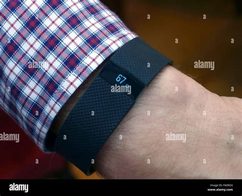 Fitbit Charge HR activity tracker worn on wrist, London Stock Photo - Alamy
