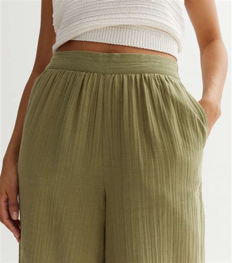 Tall Khaki Pleated Wide Leg Trousers | New Look