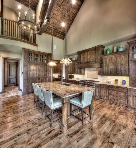 Rustic Cabin Kitchen with Medium Hardwood Floors and Granite Countertop