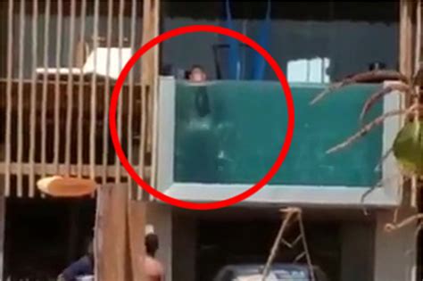 ‘Lewd’ couple has sex in transparent swimming pool as crowd watches