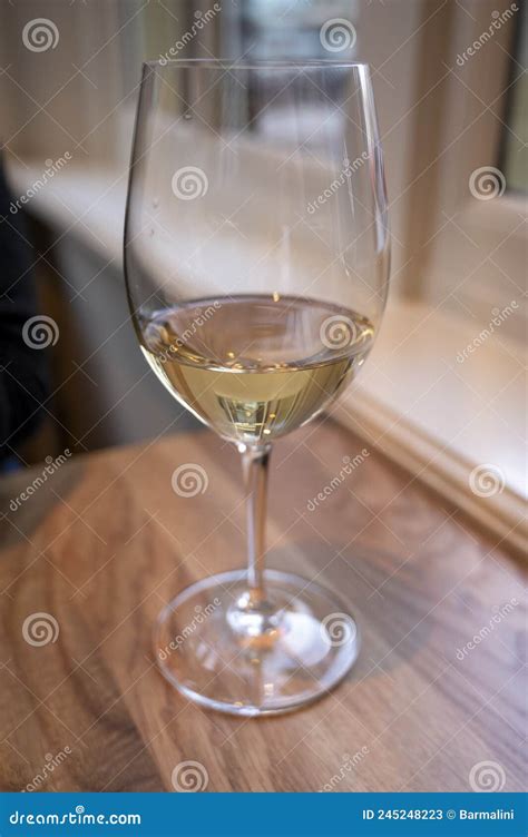 Glass of Cold Dry French Sauvignon Blanc White Wine Served in French ...