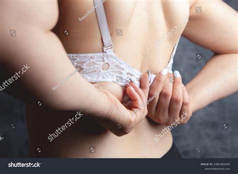 Woman Taking Off Her Bra Stock Photo 2561361625 | Shutterstock