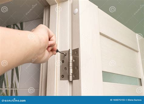 Door frame installation stock image. Image of fixing - 183075155