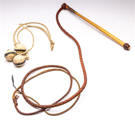 Lot - Native American weapon "Bolas" together with a leather whip (L:72 ...