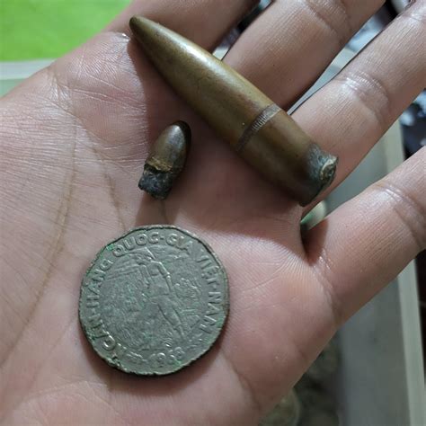 .50 cal projectile and a 9mm (I think). War Time, 1975 Era, Vietnam War. found in a box of old ...
