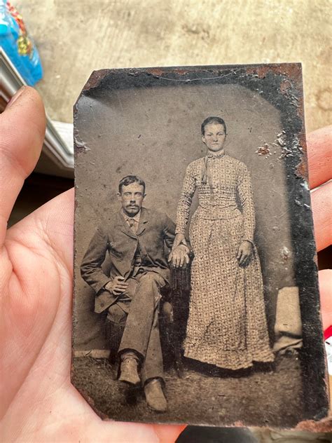 I found this tin picture today by chance. Was barely sticking out the back of one of those old ...