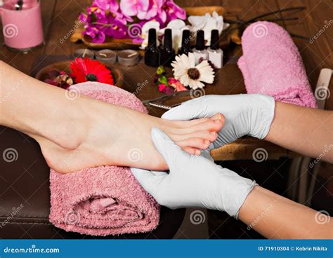 Closeup Finger Nail Care by Pedicure Specialist in Beauty Salon. Stock ...