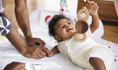 how to help baby roll over from front to back - Dorian Hsu