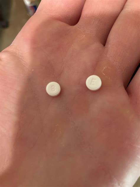 Pill With E On It