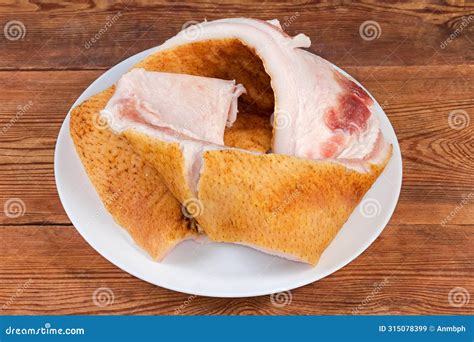 Pieces of Salted Pork Fatback on Dish on Rustic Table Stock Image ...