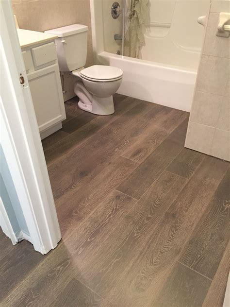 Creating A Timeless Look In Your Bathroom With Wood Tile Flooring ...
