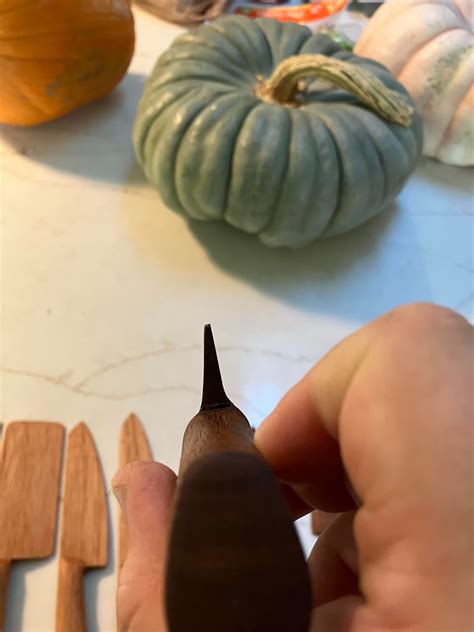 Made some toy knives! Spanish Cedar and Mayan Walnut. Bonus choil shots ...