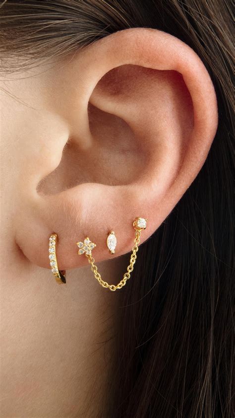 NEW! Holiday Ear Stacking Ideas | Earings piercings, Ear piercings, Cool ear piercings