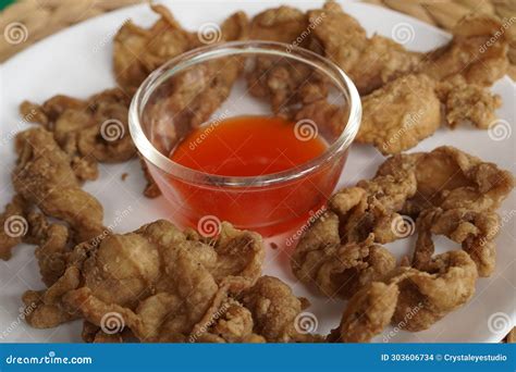 Crispy Fried Chicken Skin on Plate with Sauce Stock Photo - Image of ...