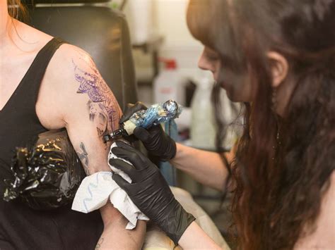 Female Tattoo Artists At Work