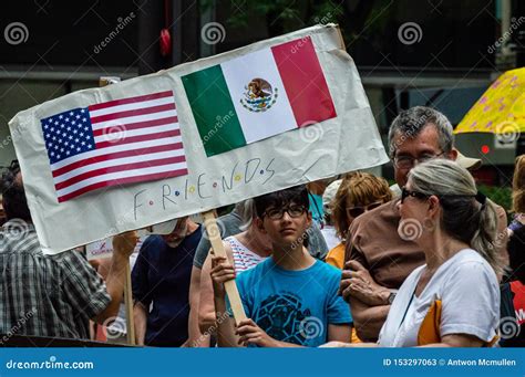 Protest Against Immigration ICE and Border Patrol. Boy with American ...