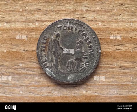 Ancient Roman denarius coin reverse showing emperor Hadrian restoring ...