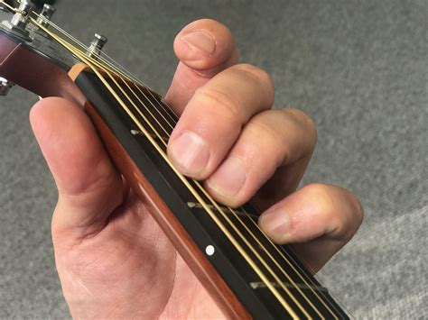 How To Play The Em7 Chord On Guitar (E Minor Seven) - With Pictures ...