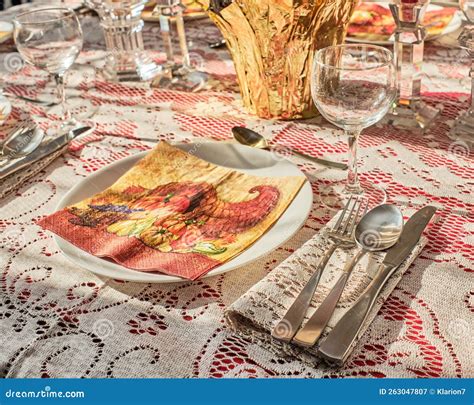 Table Prepared for Thanksgiving Dinner with Silverware and Napkins ...