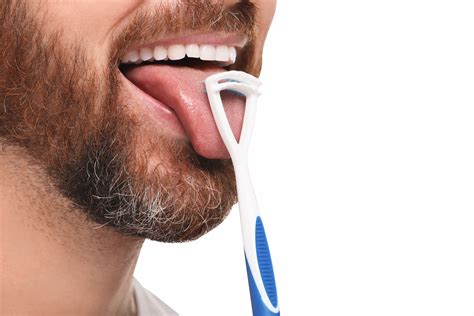 How to clean tongue scrapers - Dentek