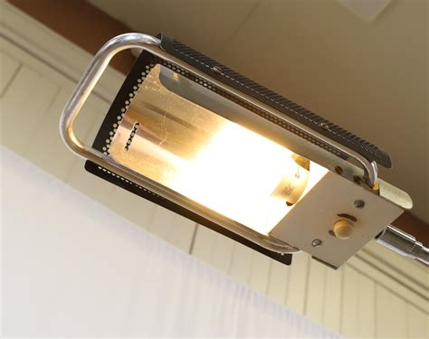 George Nelson | Floor lamp with a perforated shade | MutualArt