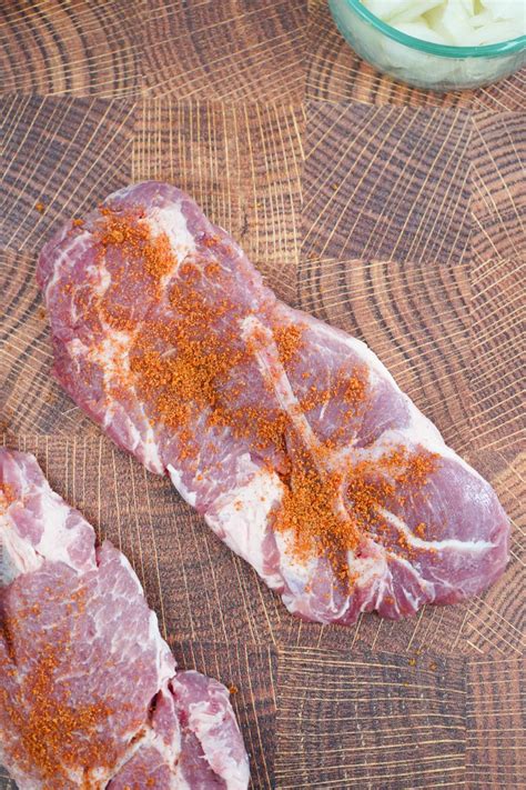 Smoked Pork Steaks with Beer Braised Onions • Smoked Meat Sunday