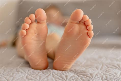 Premium Photo | Closeup view of kids feet Child foot care hygiene ...