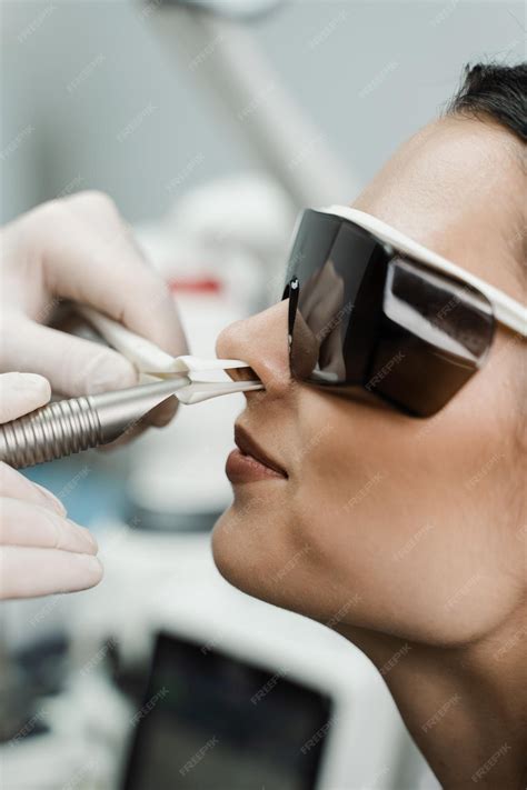 Premium Photo | Laser treatment inflammation of the nasal lining runny nose sneezing symptoms ...