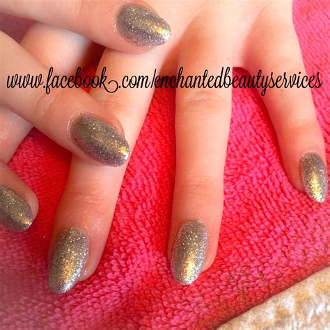 Sculptured acrylic extension with gel colour and glitter overlay ...