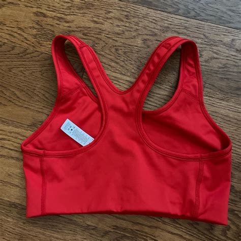 Nike red sports bra Size medium, worn couple times... - Depop