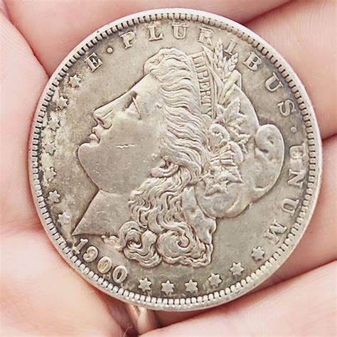 1900 SILVER MORGAN DOLLAR | EstateSales.org