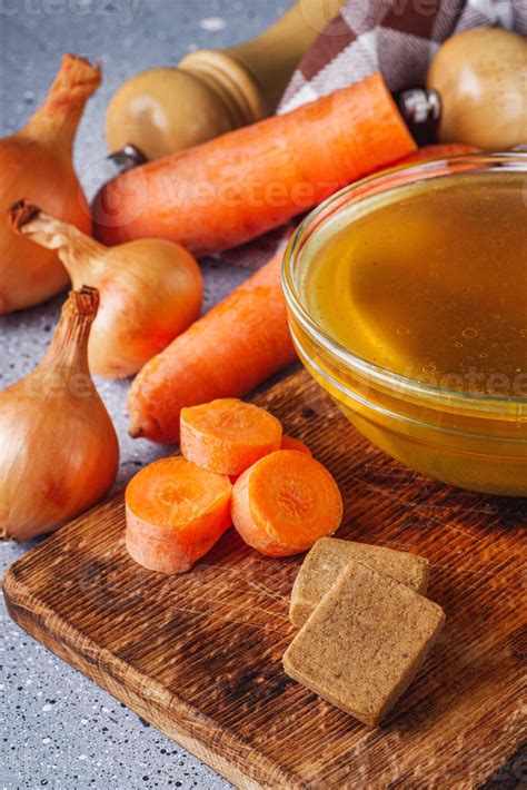 vegetable broth cube on a light stone background 49146125 Stock Photo ...