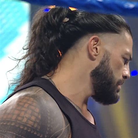 What Kind of haircut does Roman Reigns have?
