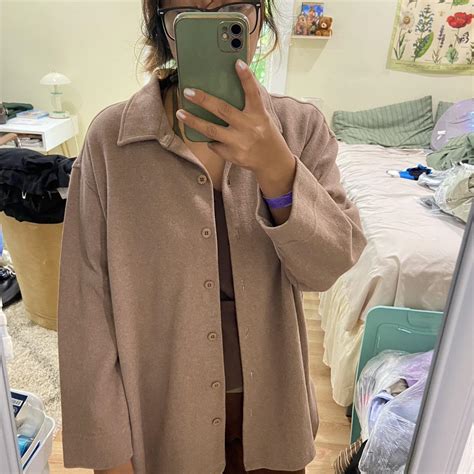 Large light brown cardigan. It’s soft inside and... - Depop