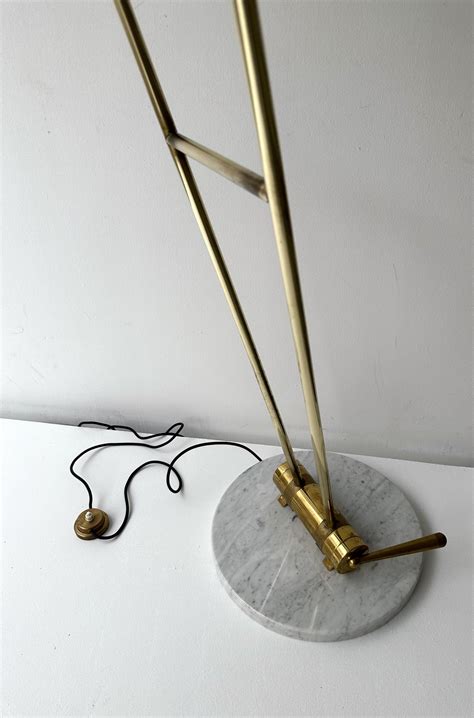 Floor lamp in brass, marble and lacquered metal by Angelo Lelii for ...