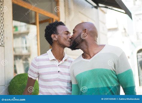 Close-up of African American Gay Men Kissing in Street Stock Photo ...