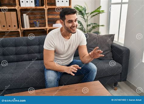 Young Hispanic Man Having Mental Therapy Sitting on Sofa at Psychology ...