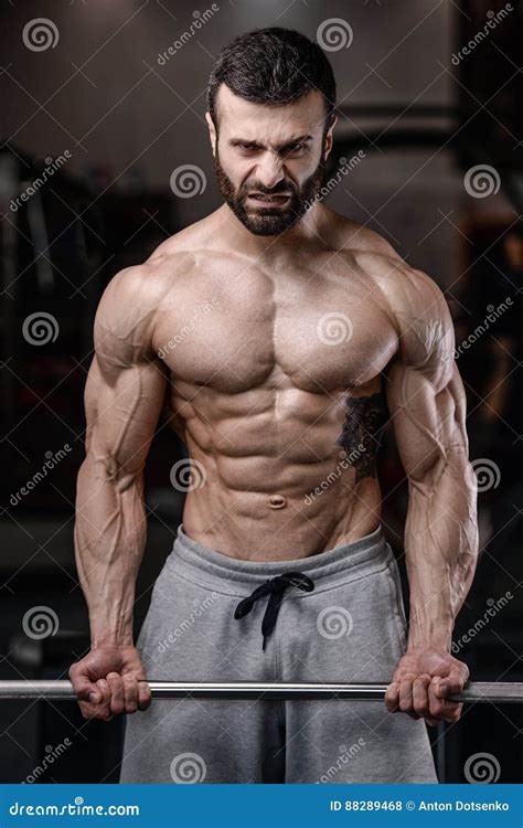 Handsome Fitness Model Train in the Gym Gain Muscle Stock Photo - Image ...