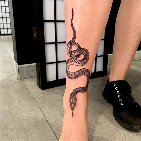 Snake Tattoo Meanings + 52 Designs that take your breath aw